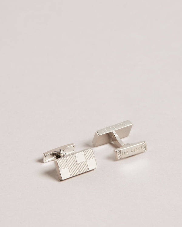 CHECKYU-Cufflinks-For the man who appreciates the finer things in life, CHECKYU are a must-have accessory. We've taken these cufflinks to the next level with our exclusive house check texture and sleek modern design. What more could he ask for? Cufflinks House check texture Metallic plating Ted Baker branded Comes in Ted Baker branded packaging- Ted Baker Romania